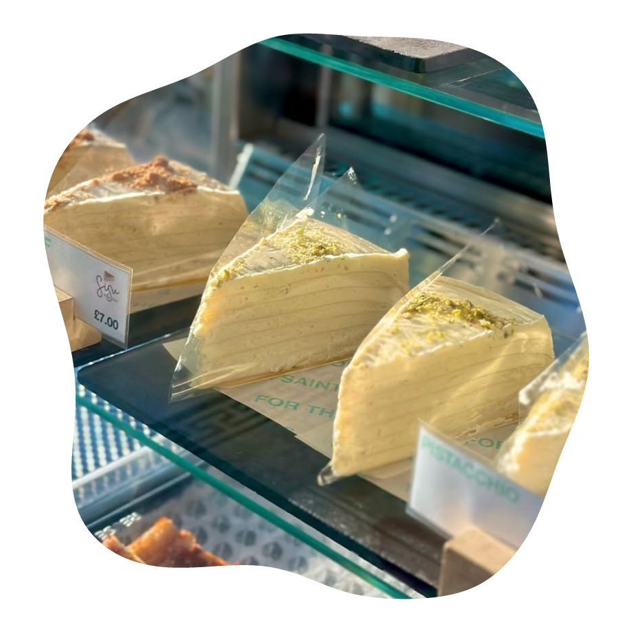 Packaged pancake cakes on a glass shelf in a store