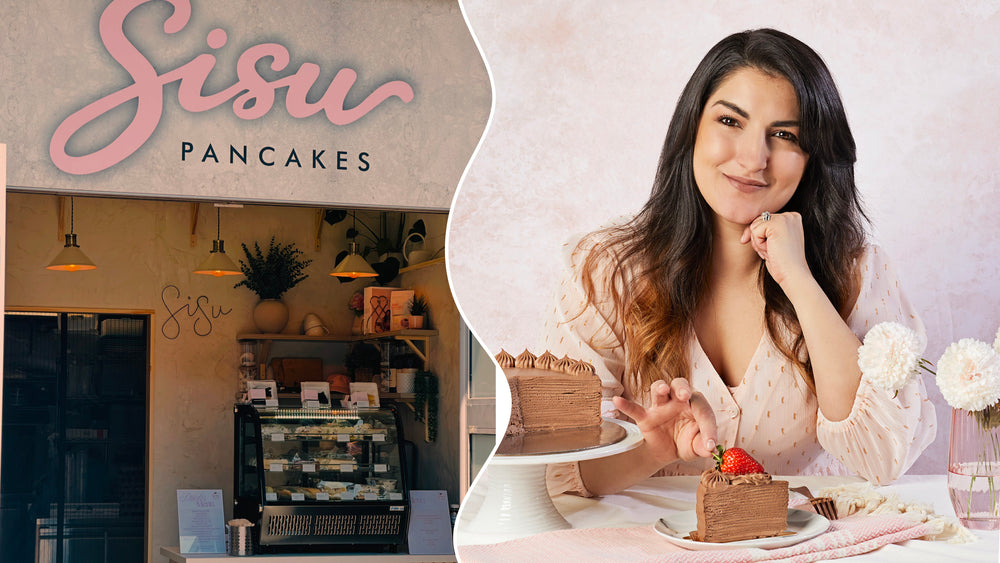A split-screen promotional image for Sisu Pancakes. The left side shows the cafe storefront with a large pink 'Sisu Pancakes' sign, while the right side features a woman smiling beside plates of chocolate pancake cake and a slice of cake on a table.